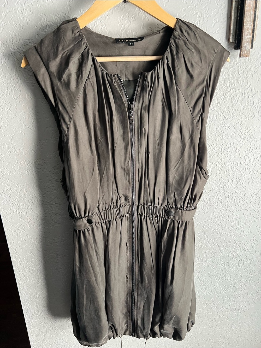 AKIRA Olive-Tone Front sleeveless zip-front jacket/vest or tunic-style piece.